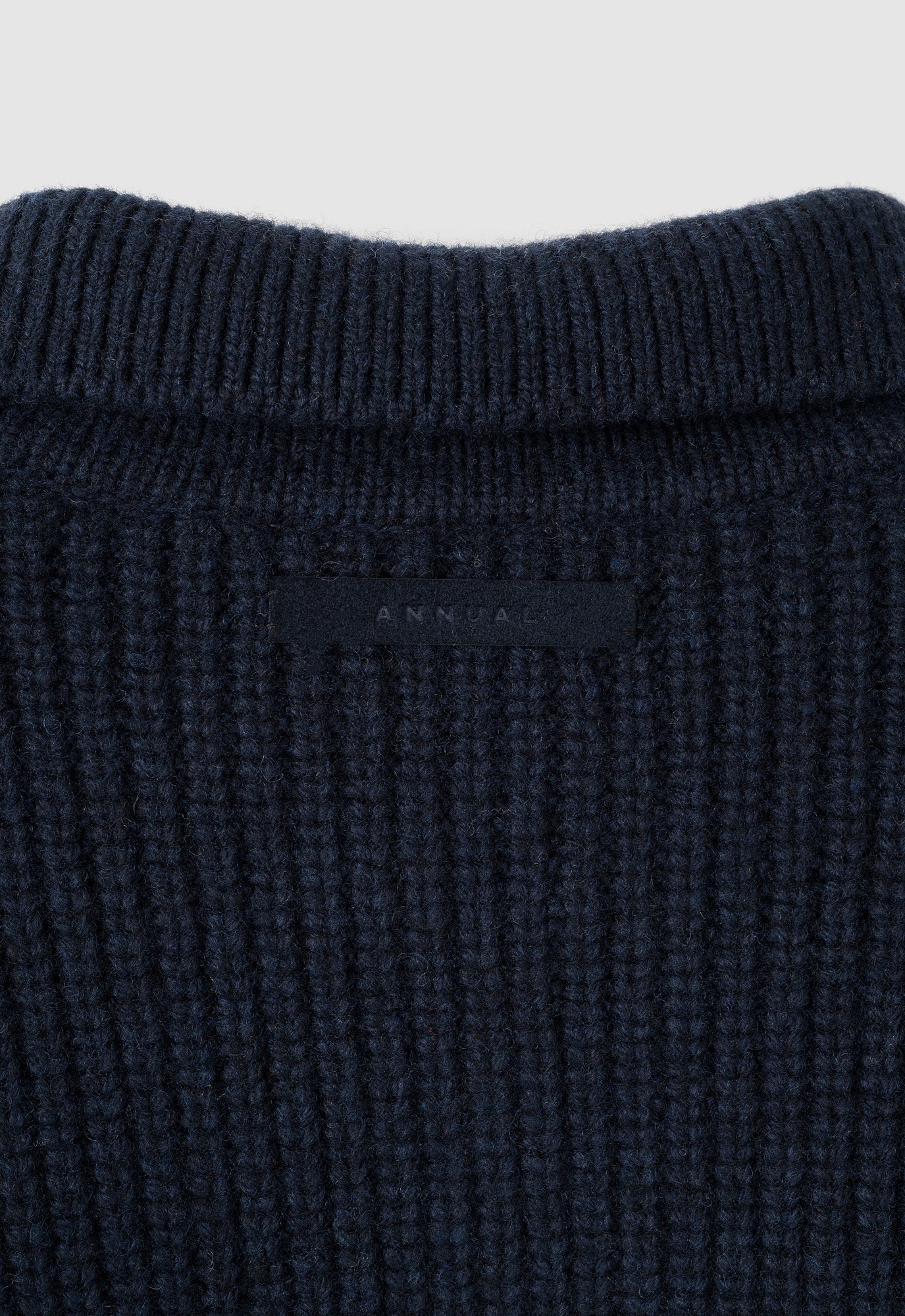 ANNUAL STRIPED POLO SWEATER